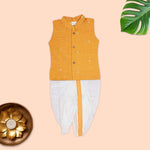 Boy wearing a traditional Mandarin collar shirt and Panchagajam set in festive ethnic wear by Boon Babies.