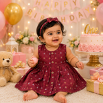 Maroon ethnic sleeveless frock for baby girls by Boon Babies, featuring traditional design and comfortable fabric.