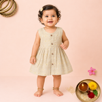 Ivory ethnic sleeveless frock for baby girls by Boon Babies, featuring traditional design and soft fabric for special occasions.