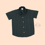 Dark green silk ethnic shirt for boys aged 12 months to 5 years, with golden vertical stripe detailing and wooden buttons – from Boon Babies’ festive wear range.
