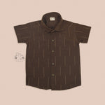 Coffee brown silk shirt for boys with subtle gold zari lines, paired with traditional white pattu dhoti – Boon Babies festive ethnic collection.