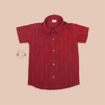 Bright red silk shirt for boys with golden stripes, paired with white pattu dhoti – Boon Babies ethnic wear collection.