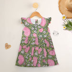 Soft cotton frock with cap sleeves and floral block print. Perfect comfort and style for girls aged 6M–5Y.