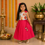 Girls floral top and pleated skirt ethnic set in pink by Boon Babies, featuring a colorful floral print and stylish pleats.