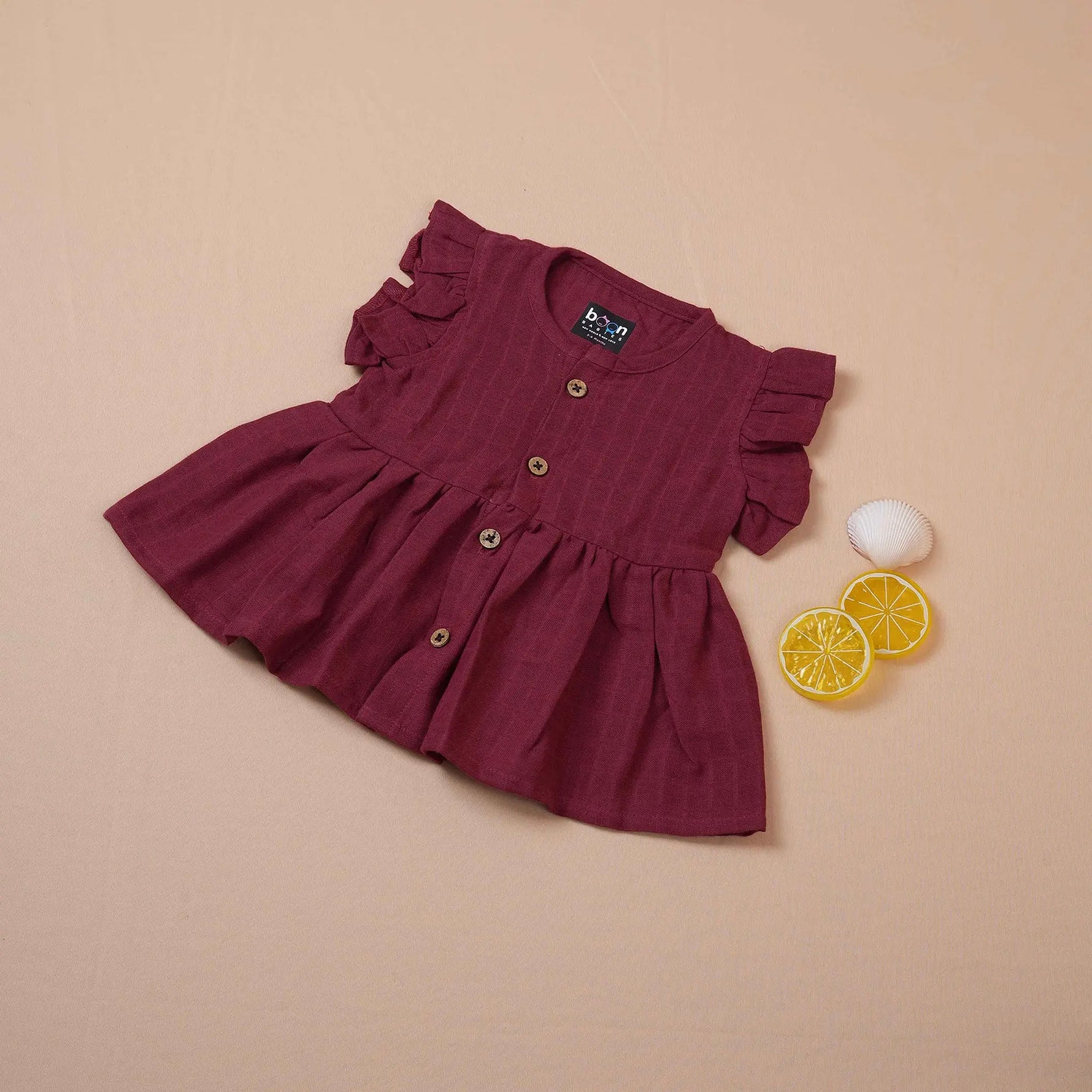 Maroon Muslin Baby Frock – Soft & Stylish with Wooden Buttons Boon Babies