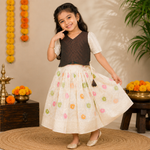 Girls floral ethnic top and skirt set from Boon Babies, featuring colorful cream fabric with traditional patterns.