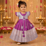 Elegant purple and silver ethnic frock for girls by Boon Babies, featuring intricate Pattu design and traditional style.