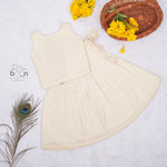 Girls Onam Sleeveless Silk Frock with Golden Stripes – Festive Wear
