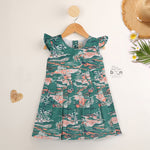 Green cotton frock with tropical island print and cap sleeves for baby girls aged 6 months to 5 years – Boon Babies kidswear collection from Coimbatore.