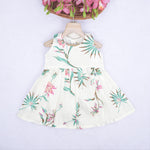 Toddler girl in a white sleeveless frock with navy blue and pink forest animal print – pure cotton summer dress from Boon Babies, Coimbatore.