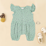 Mint green baby romper in crinkled muslin with leafy print and flutter sleeves, designed for newborns aged 0 to 12 months – Boon Babies Coimbatore collection.