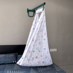Printed cotton cradle for newborn babies by Boon Babies featuring colorful balloon print, soft and comfortable for infants.