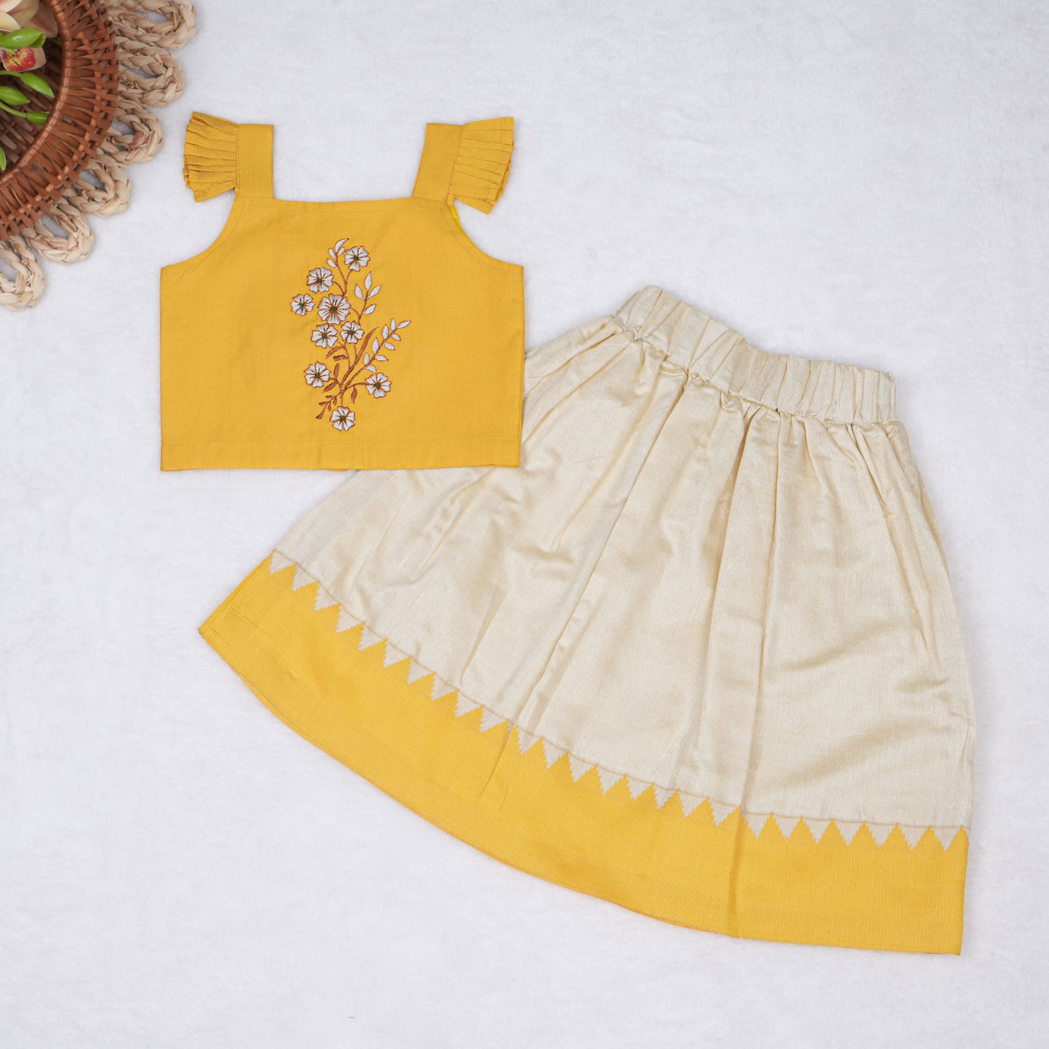 Mustard yellow cotton top with cream skirt, soft lining, elastic waist and comfy fit – perfect Kerala-style ethnic wear for girls aged 1–5 years.