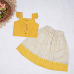Mustard yellow cotton top with cream skirt, soft lining, elastic waist and comfy fit – perfect Kerala-style ethnic wear for girls aged 1–5 years.
