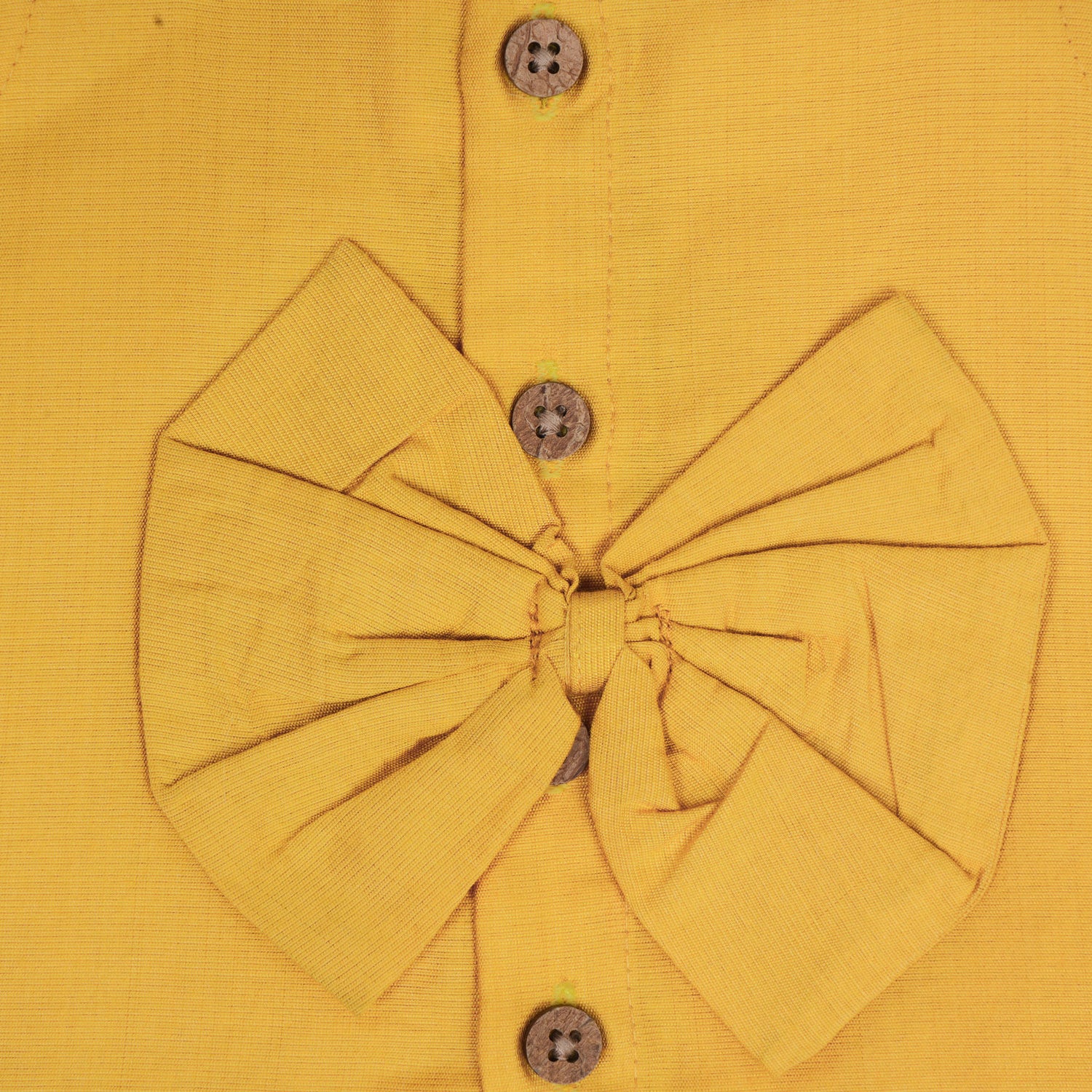 Mustard yellow cotton top with cream skirt, soft lining, elastic waist and comfy fit – perfect Kerala-style ethnic wear for girls aged 1–5 years.