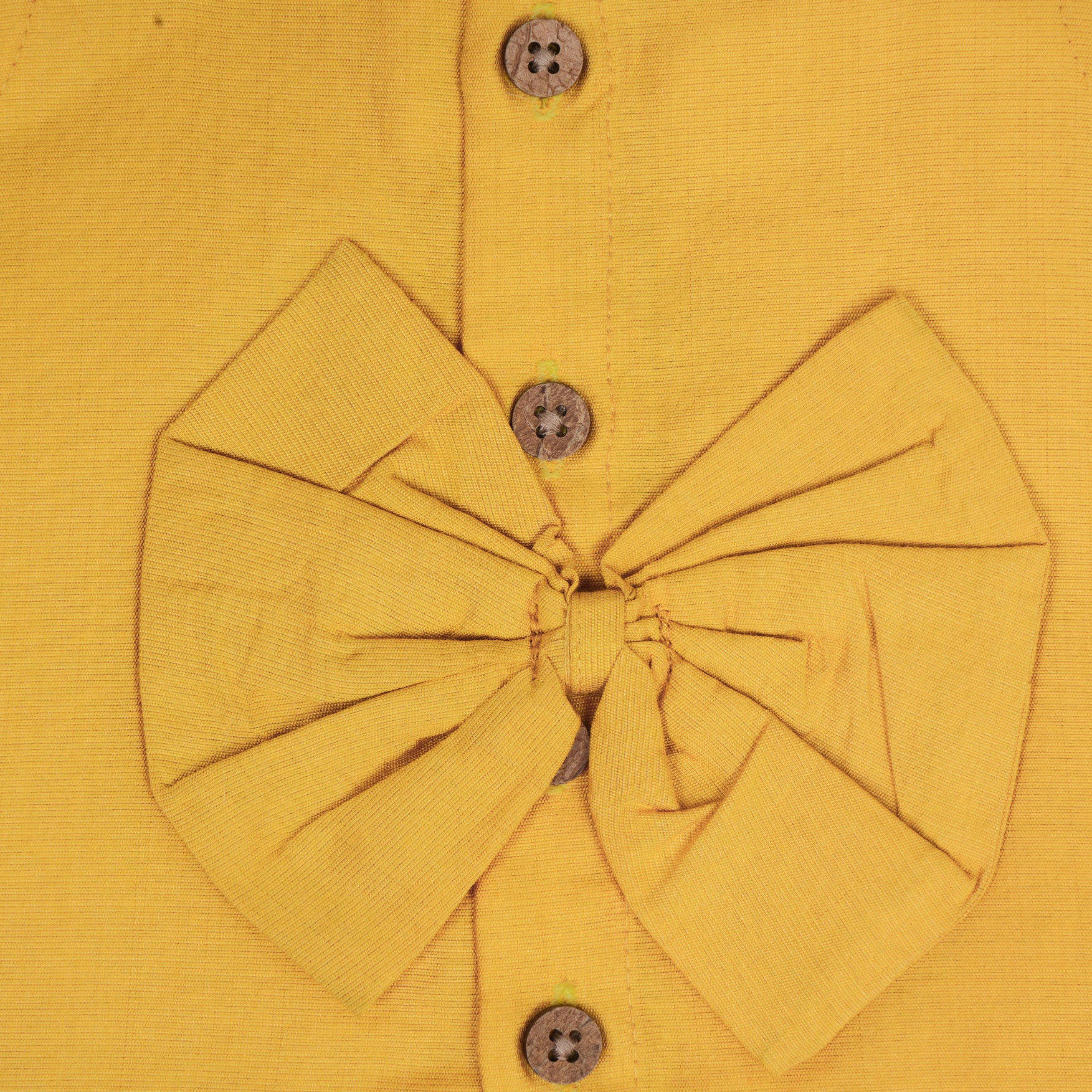 Mustard yellow cotton top with cream skirt, soft lining, elastic waist and comfy fit – perfect Kerala-style ethnic wear for girls aged 1–5 years.