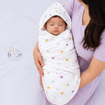 Boonbabies printed 2-layer muslin hooded baby towel with soft, colorful print, measuring 70x70 cm, ideal for newborns.