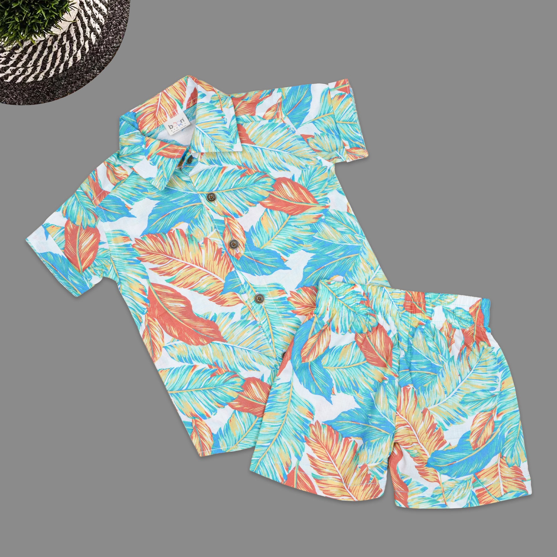 Boys casual co-ord set with printed cotton shirt and matching shorts featuring a straight collar, by Boon Babies.