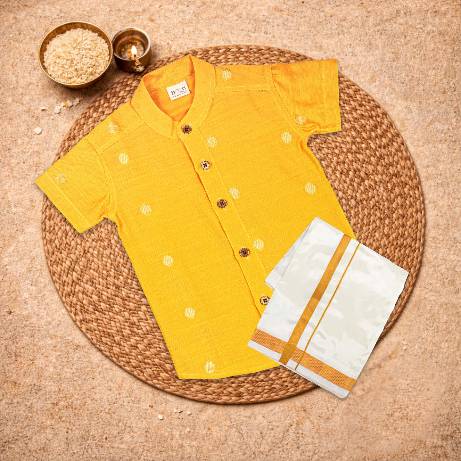 Yellow raw silk ethnic shirt and dhoti set for festive wear by Boon Babies, featuring a solid yellow design and traditional style.