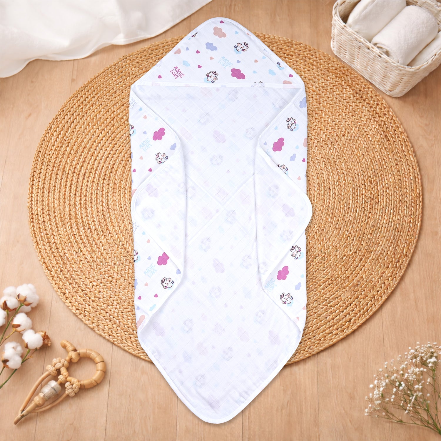 Boonbabies printed 2-layer muslin hooded baby towel with soft fabric, 70x70 cm wrap blanket for newborns in gentle print design.