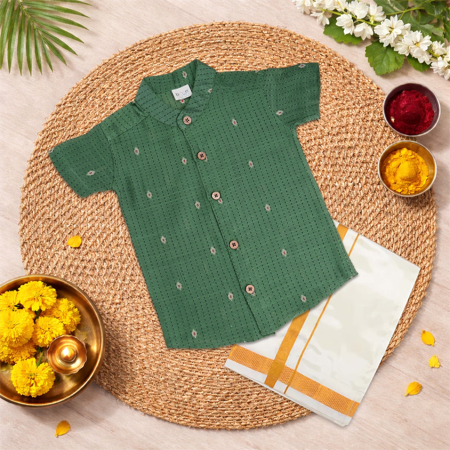 Elegant green silk cotton shirt with classic dhoti—perfect for festive and traditional occasions.