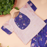 Pink and purple floral ethnic skirt set with matching top from Boon Babies, featuring traditional patterns and vibrant fabric.