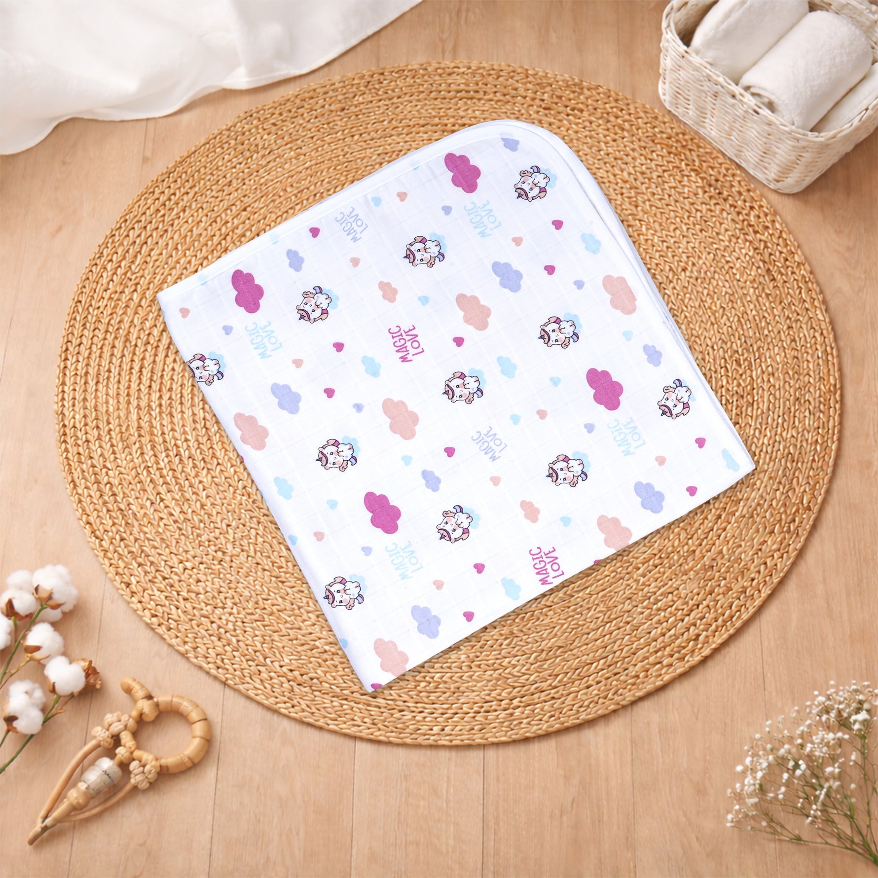 Boonbabies printed hooded muslin baby towel with 2 layers, soft and absorbent, featuring a cute printed design for newborns.