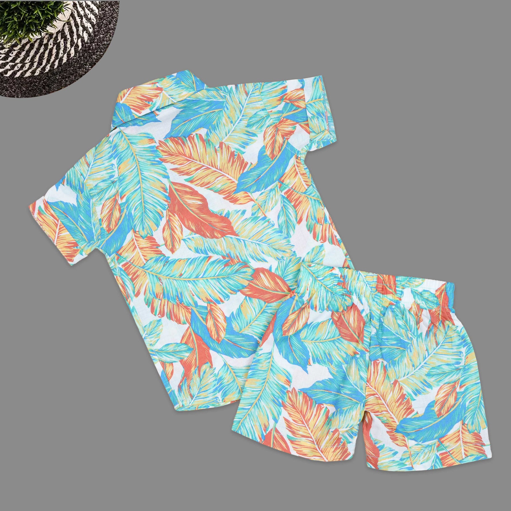 Boys casual co-ord set by Boon Babies featuring a printed cotton shirt with straight collar and matching shorts.