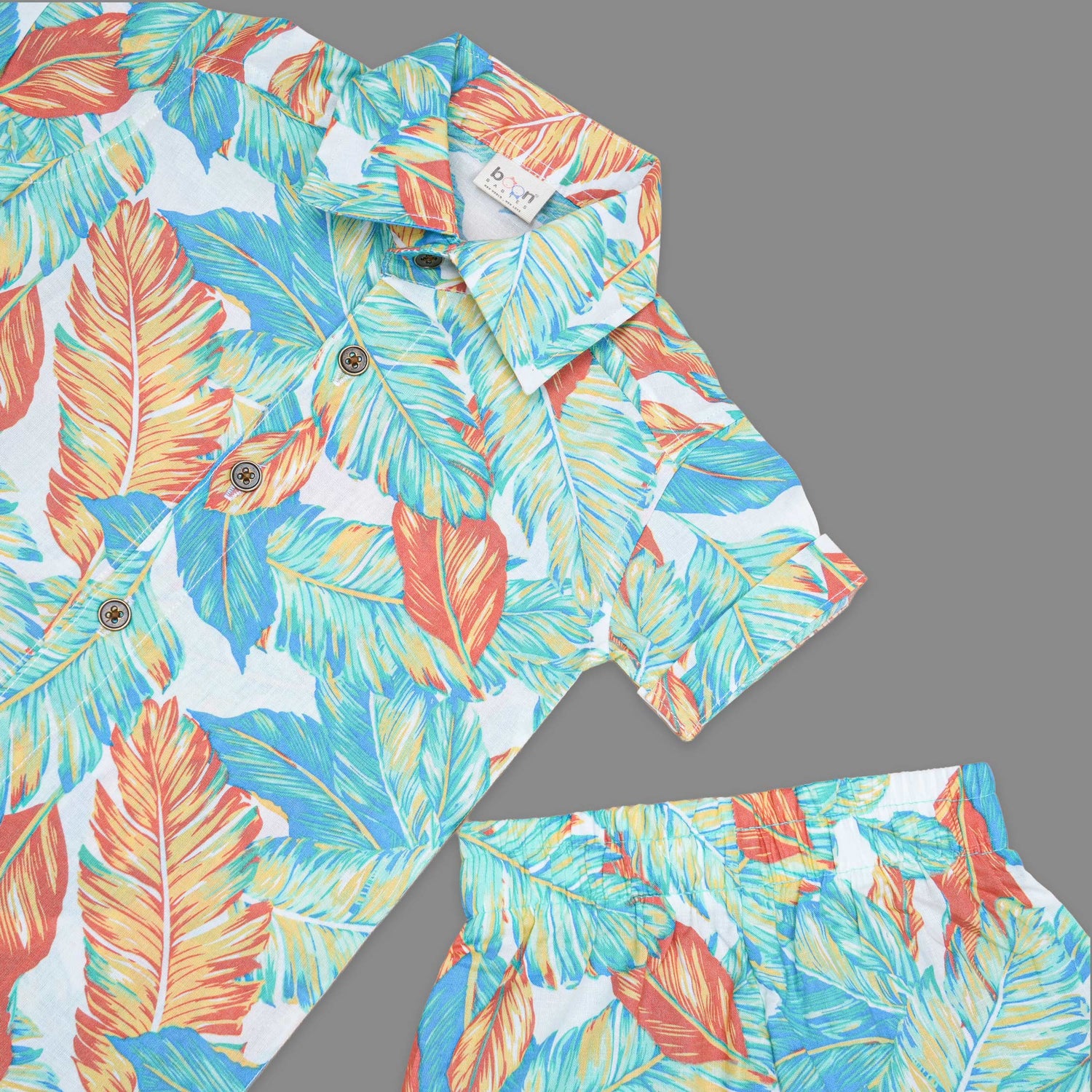 Soft cotton printed co-ord set for boys with straight collar shirt and matching shorts, perfect for casual and outdoor wear.