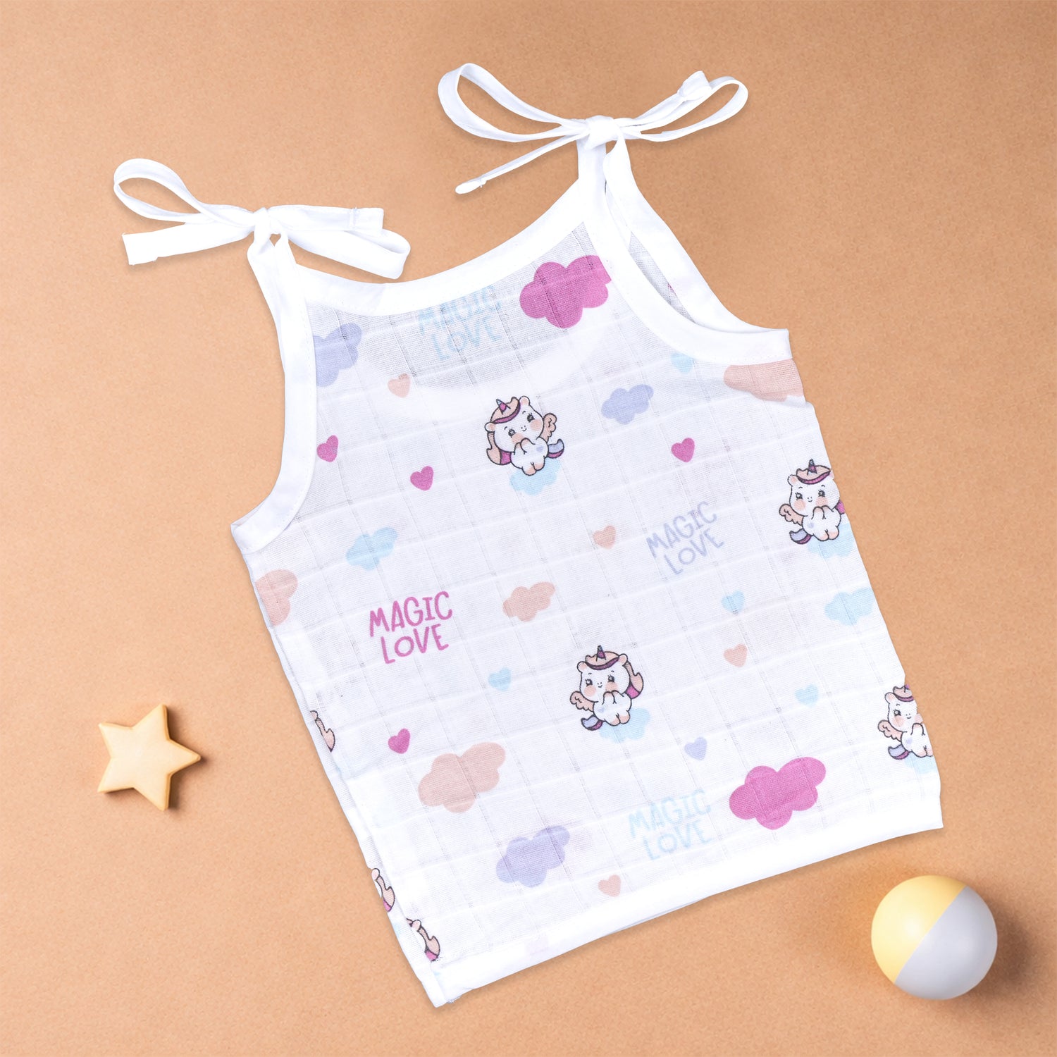 Soft printed boonbabies muslin knot jabla for babies aged 0-6 months, featuring a tie-up top with a gentle, comfortable fabric.