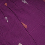 Baby girl wearing a purple Boon Babies ethnic sleeveless frock, featuring traditional embroidery and comfortable fabric.