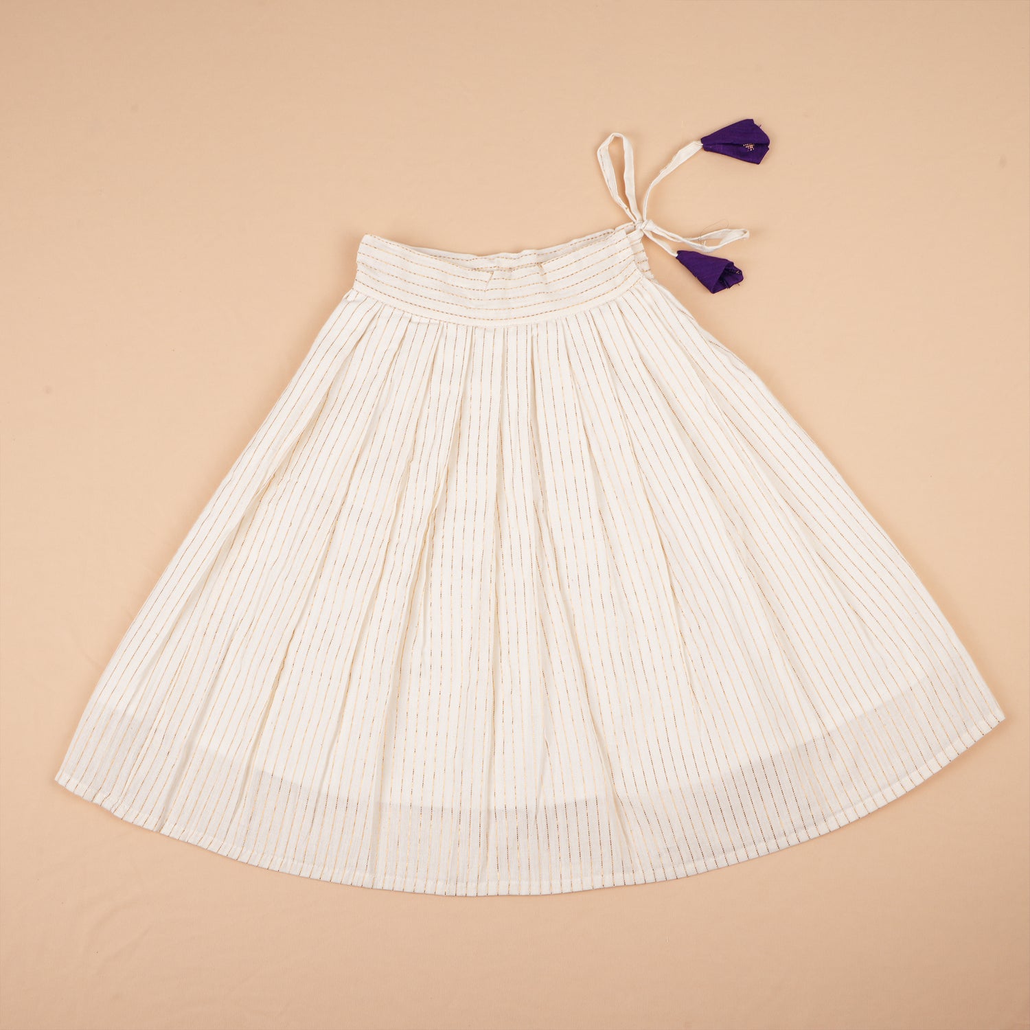 Soft silk ethnic top and skirt set with gold butta print and striped skirt, perfect for traditional and outdoor wear.