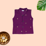 Boy wearing a Boon Babies mandarin collar shirt and panchagajam traditional ethnic wear set, with colorful patterns.