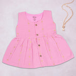 Pink ethnic sleeveless frock for baby girls by Boon Babies, featuring traditional design and soft fabric for comfortable wear.