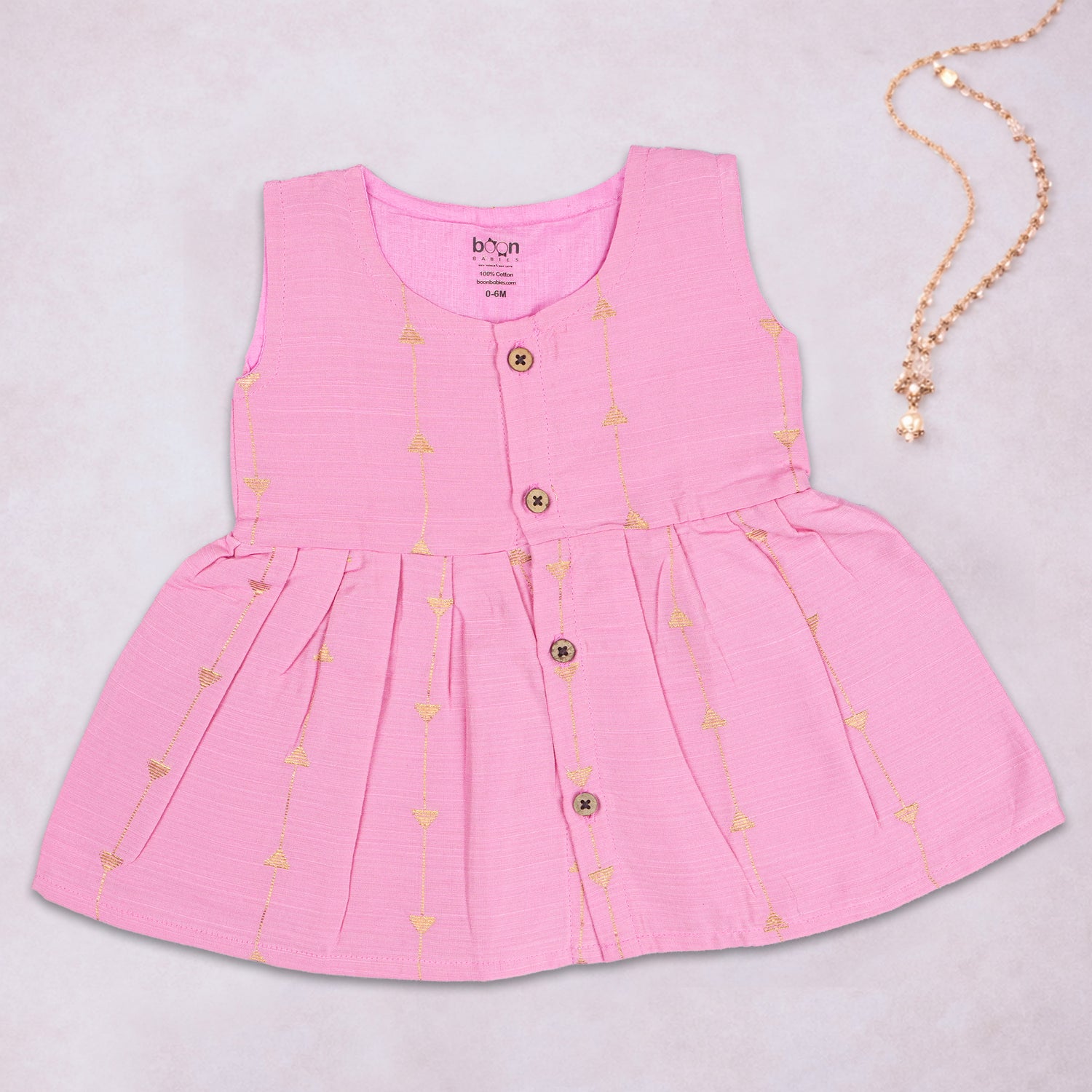 Pink ethnic sleeveless frock for baby girls by Boon Babies, featuring traditional design and soft fabric for comfortable wear.
