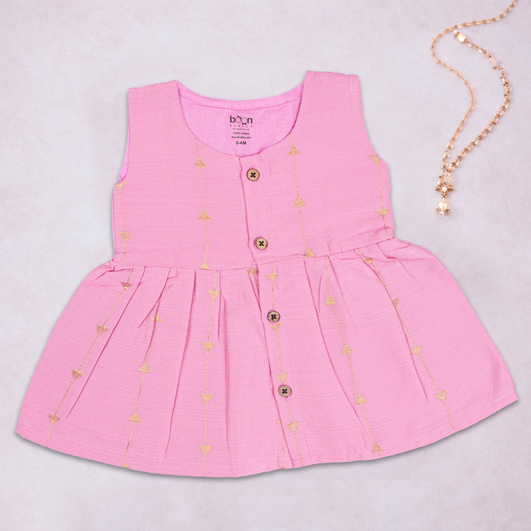 Pink ethnic sleeveless frock for baby girls by Boon Babies, featuring traditional design and soft fabric for comfortable wear.
