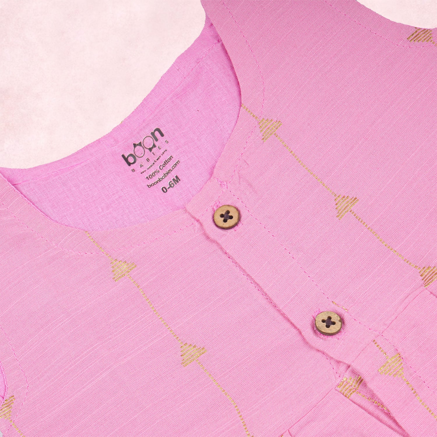 Pink ethnic sleeveless frock for baby girls by Boon Babies, featuring traditional embroidery and soft fabric.