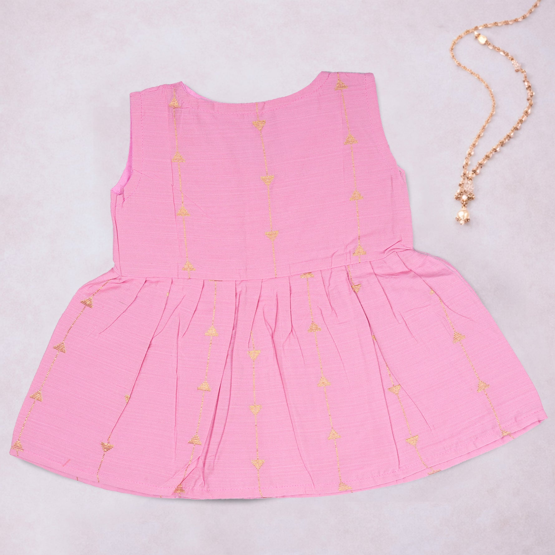 Pink ethnic sleeveless frock for baby girls by Boon Babies, featuring traditional design and comfortable fabric.