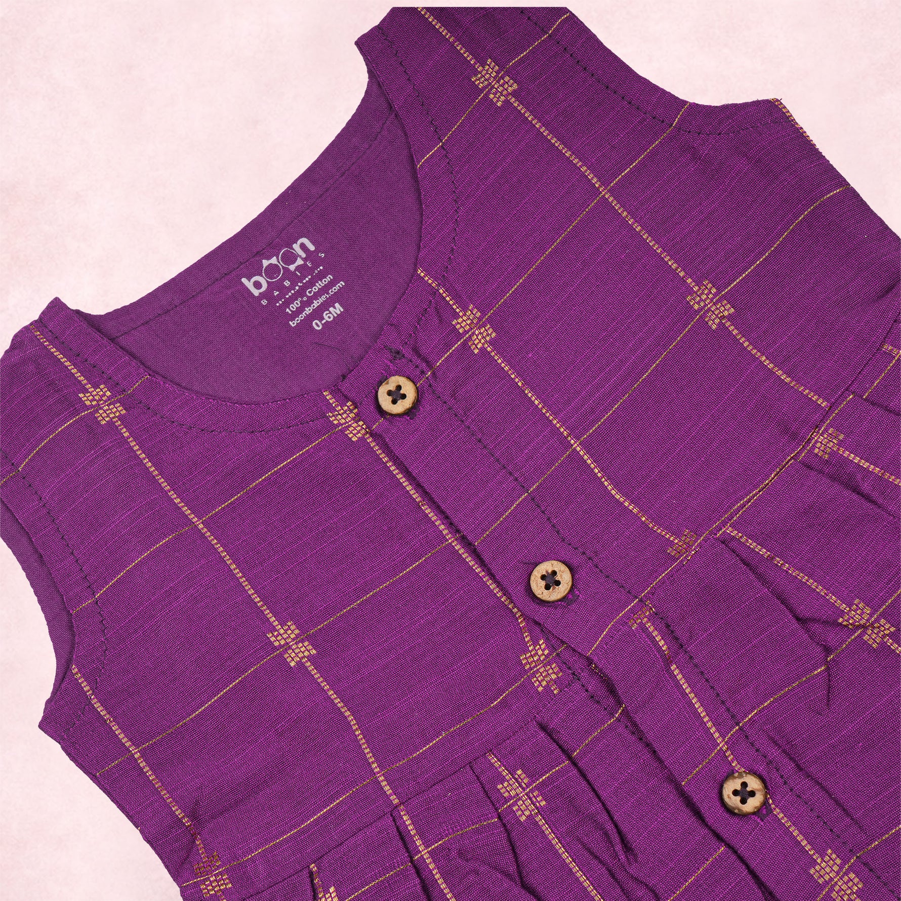 Purple ethnic sleeveless frock for baby girls by Boon Babies, featuring traditional design and comfortable fabric.
