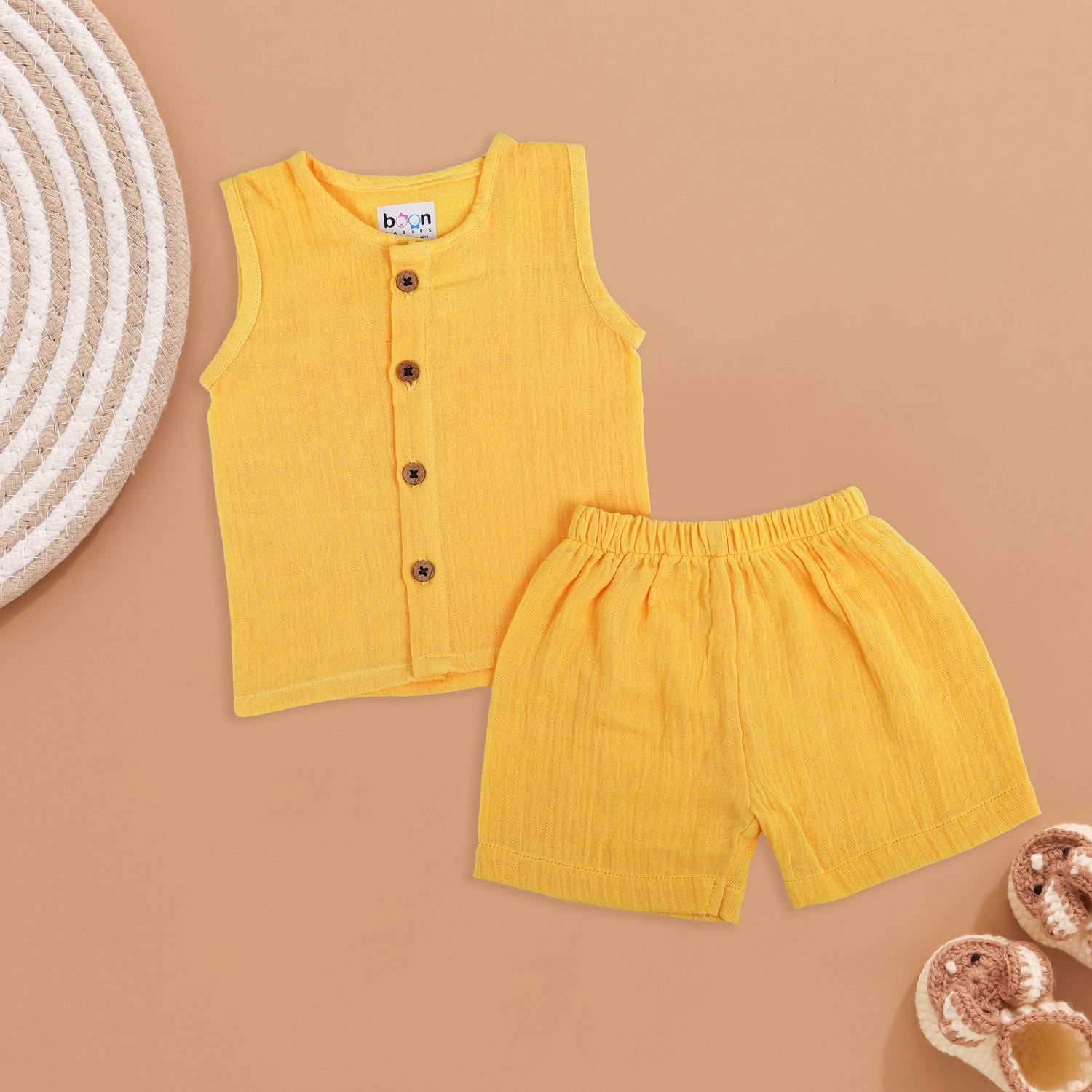 Muslin Babywear: Yellow Sleeveless Shirt and Shorts Set