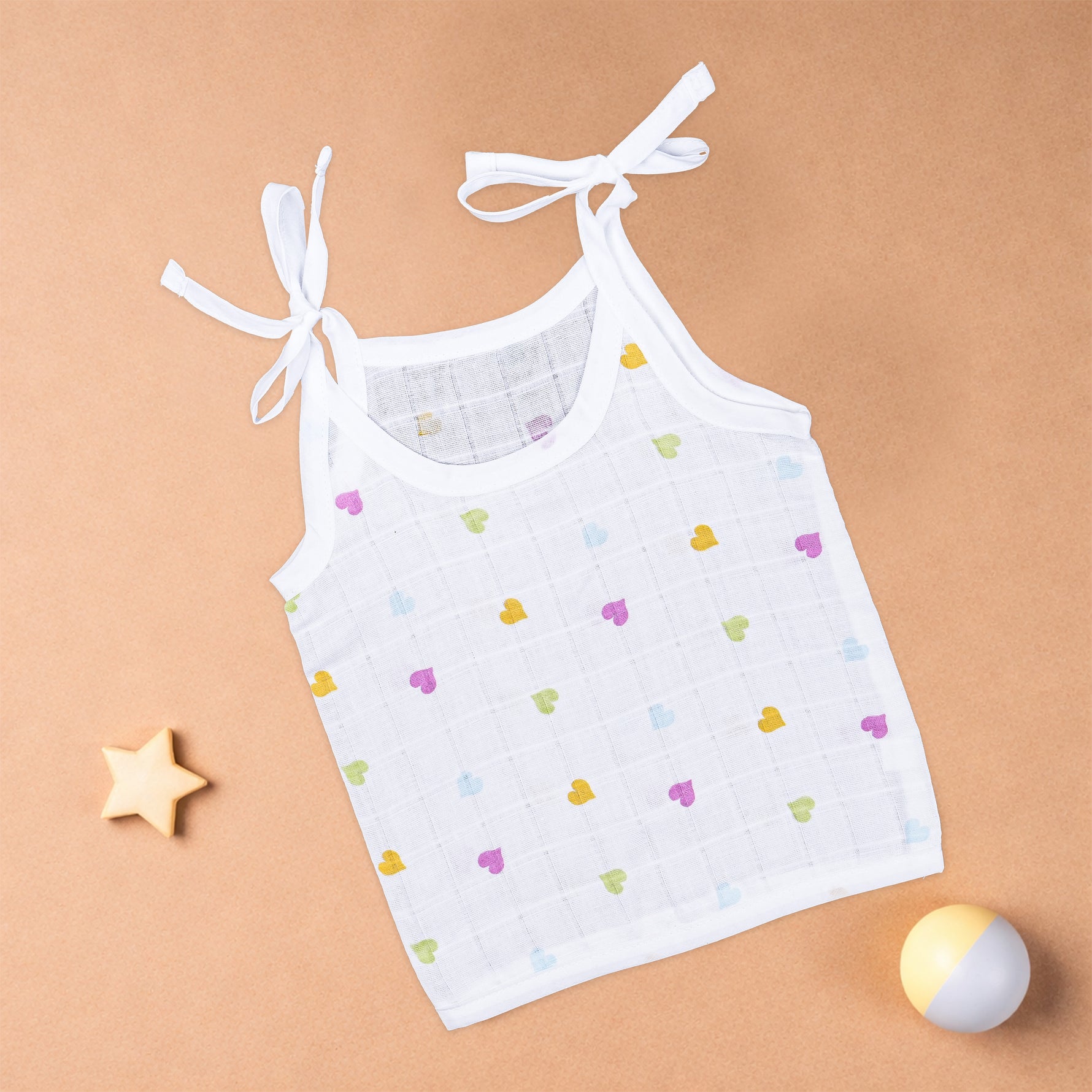Boonbabies muslin knot jabla for babies, soft printed tie-up baby top in light fabric, suitable for ages 0-6 months.