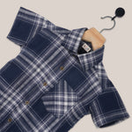 Boys' navy check cotton shirt with straight collar, casual printed shirt by Boon Babies, shown in close-up image.