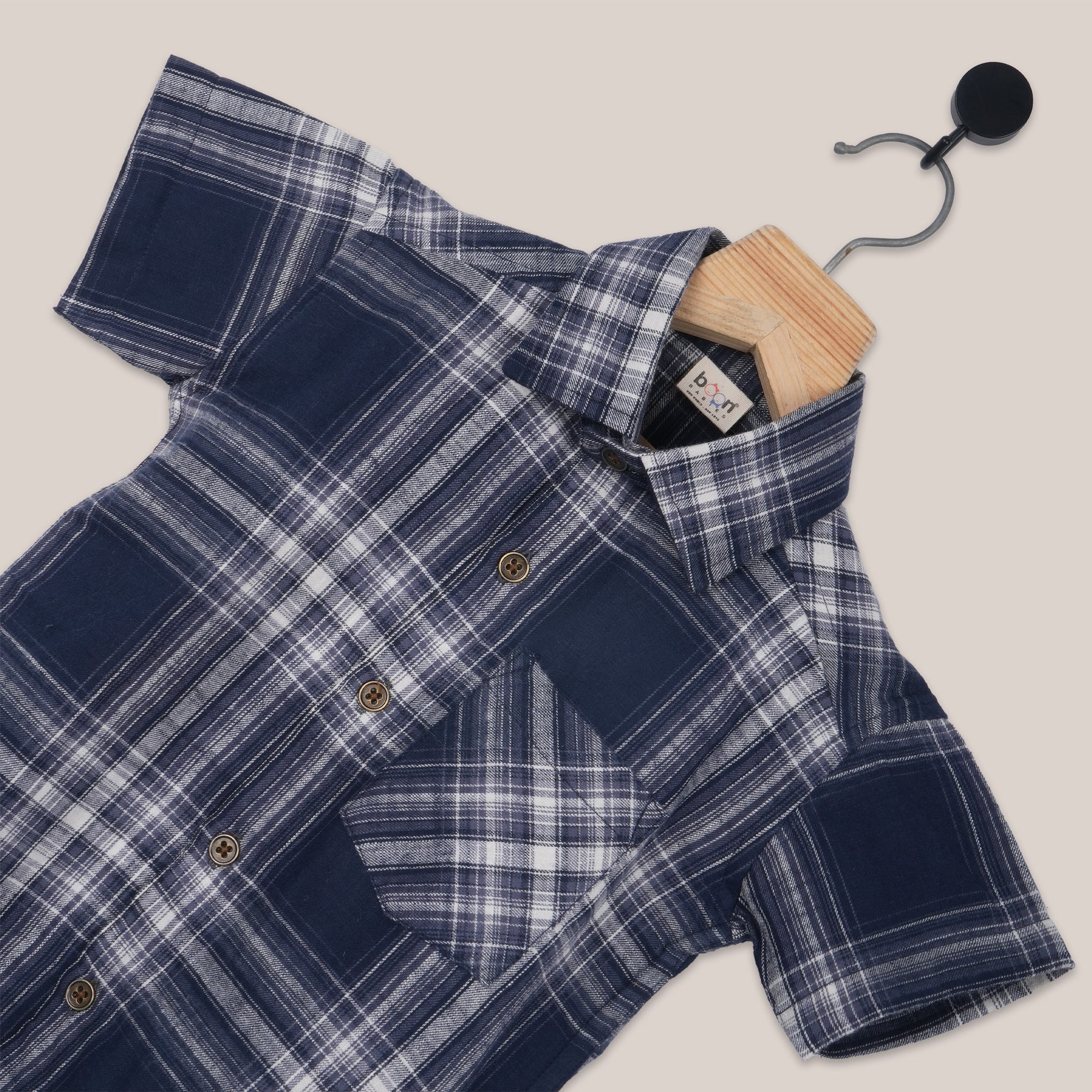 Boys' navy check cotton shirt with straight collar, casual printed shirt by Boon Babies, shown in close-up image.