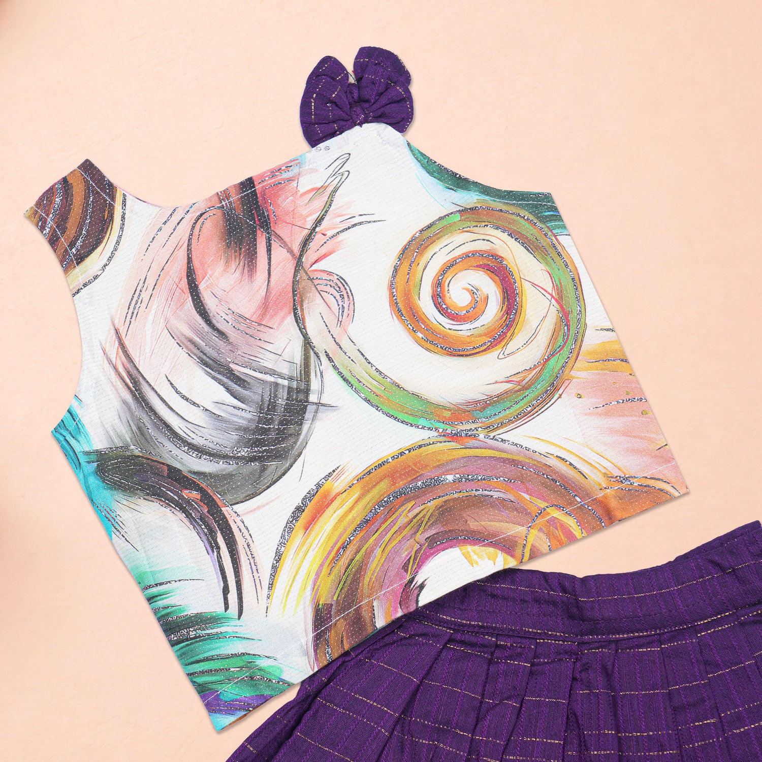 Girls abstract printed ethnic top and purple pleated skirt set by Boon Babies, featuring colorful patterns and comfortable fabric.