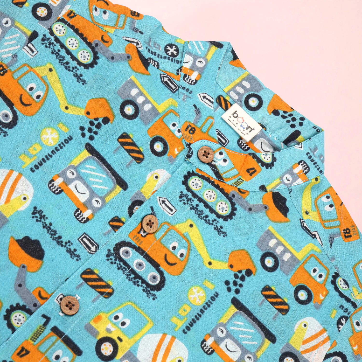 Boon Babies boys' Aqua Truck print co-ord set with printed Chinese collar shirt and matching shorts on a child model.