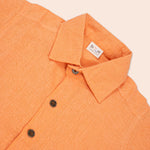 Boys' orange cotton printed shirt with straight collar by Boon Babies, featuring a casual style and colorful design.