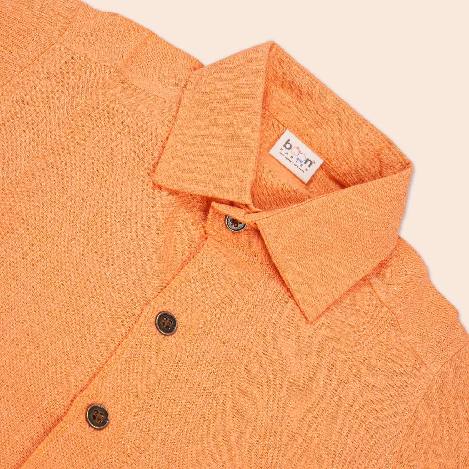 Boys' orange cotton printed shirt with straight collar by Boon Babies, featuring a casual style and colorful design.