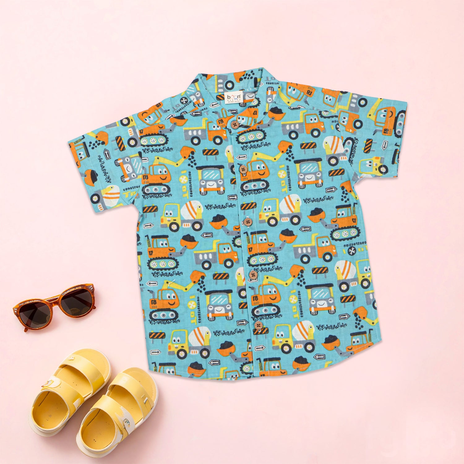 Boon Babies boys co-ord set with aqua truck print, includes a printed Chinese collar shirt and matching shorts.