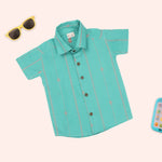 Boys teal and coral handloom cotton shirt and shorts set with straight collar, printed design, by Boon Babies.