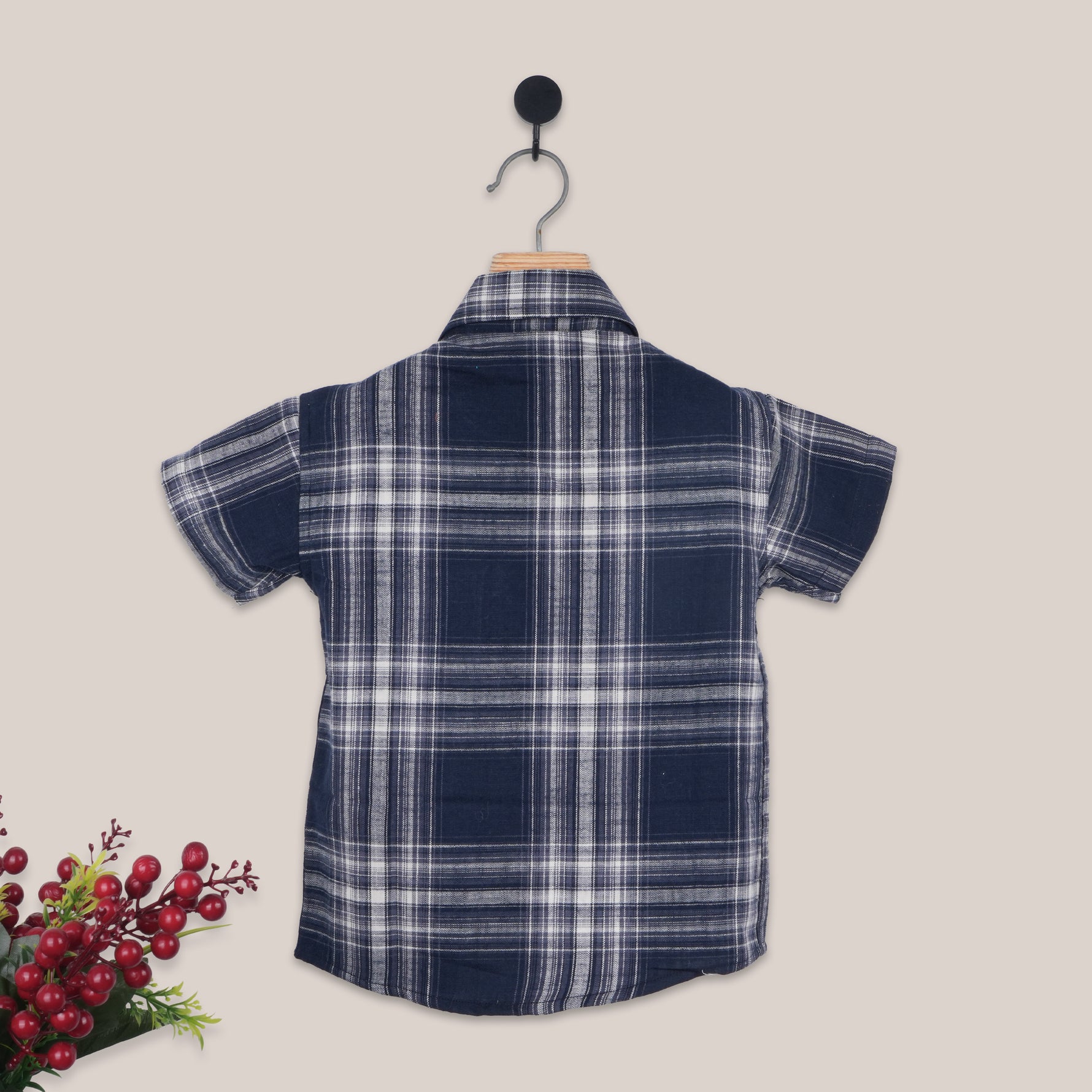 Boys navy check cotton shirt with straight collar, casual style, printed by Boon Babies, shown on a hanger.
